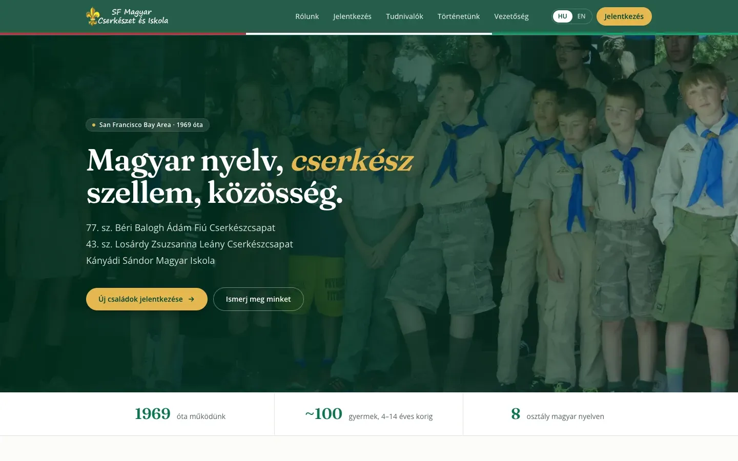 Desktop screenshot of the rebuild: the dark green hero over the scout group photo, headline and sign-up button, and a stat strip — 1969, about 100 children, 8 classes.
